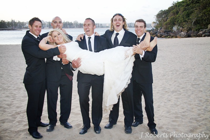 Groomsmen holding the bride up - wedding photography sydney